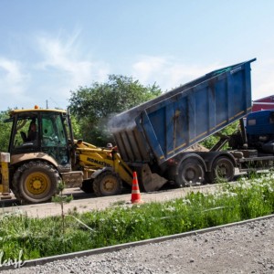 В Смоленске на улице Попова асфальтируют тротуары